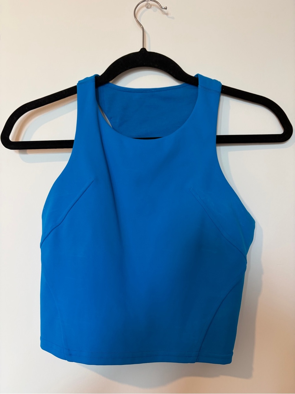 Lululemon vibrant blue women’s cropped tank with a built in bra. Size 6